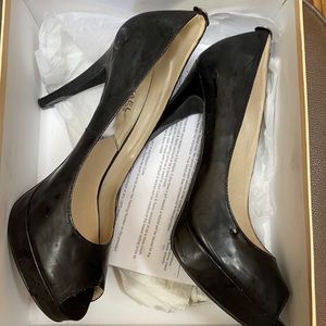 Stunning classic Michael Kors patent black heels.